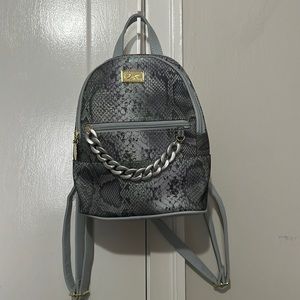 NWT Luv Betsey woman’s snake mini chain trim Backpack